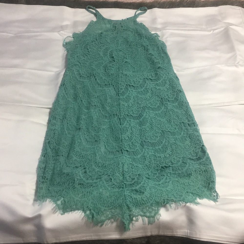 Aqua Free people lace slip dress. Very flattering!